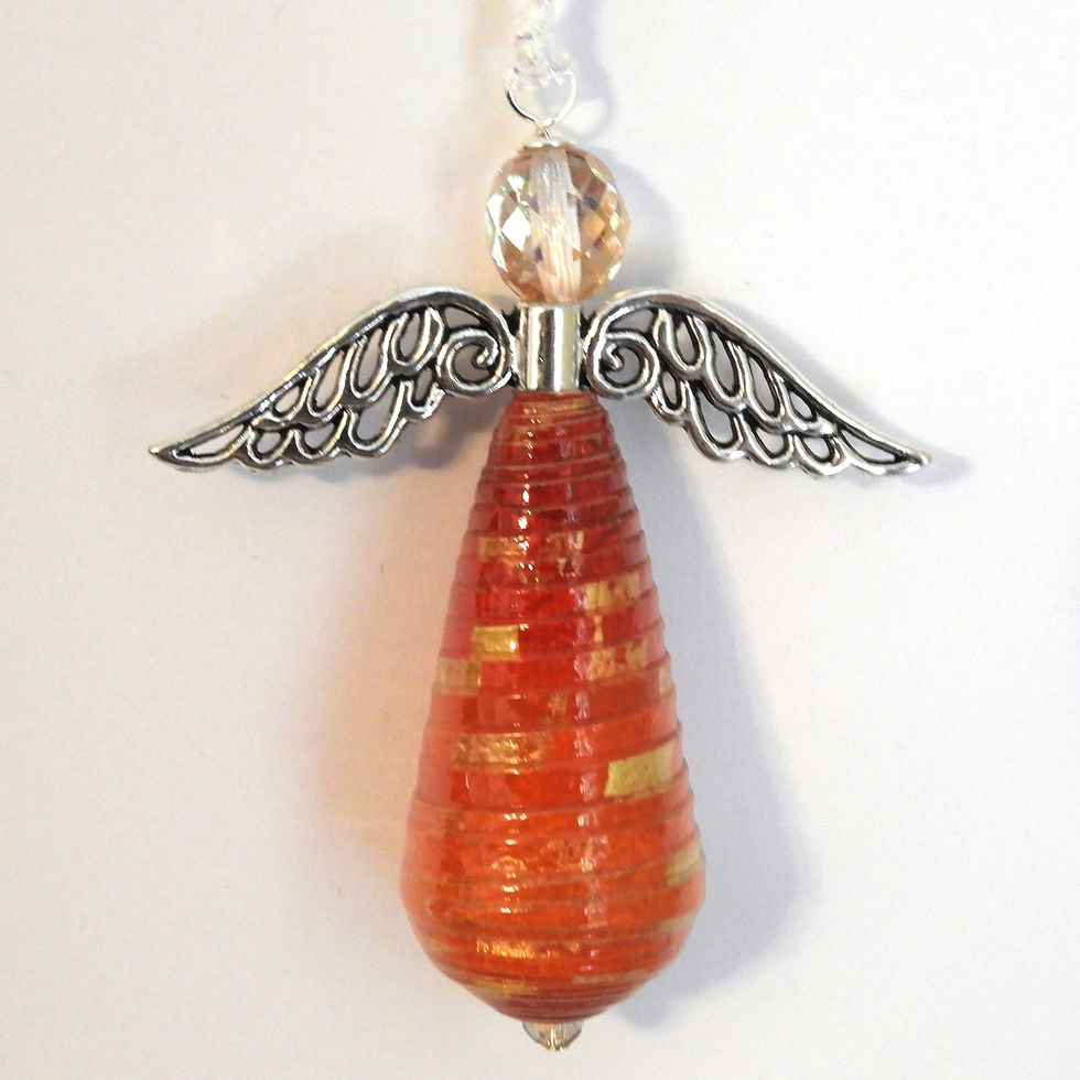 Thumbnail: Red, orange, and gold ombre paper bead angel ornament hanging on a white background.