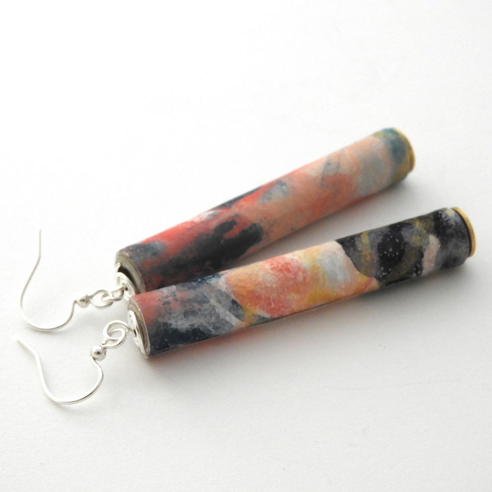 Thumbnail: Coral, navy, white, and gold abstractly paper bead earrings on a white background.