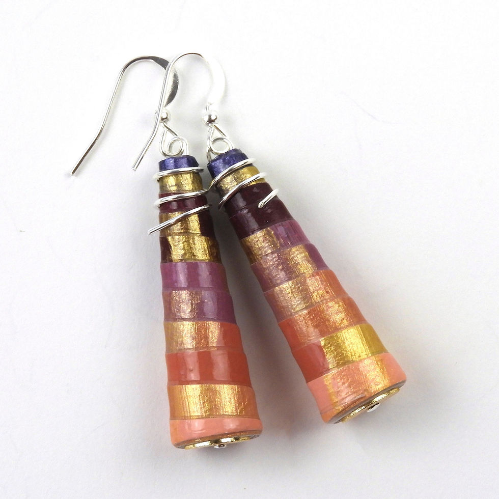 Thumbnail: Purple and pink ombre paper bead earrings on a white background.