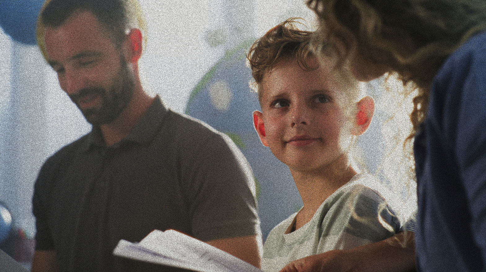 Mother and Father Looking at School Test