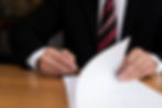 unrecognisable-business-man-writing-front-view.jpg