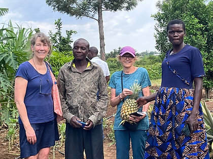 Peter and Grace with founders abundant farm.jpeg