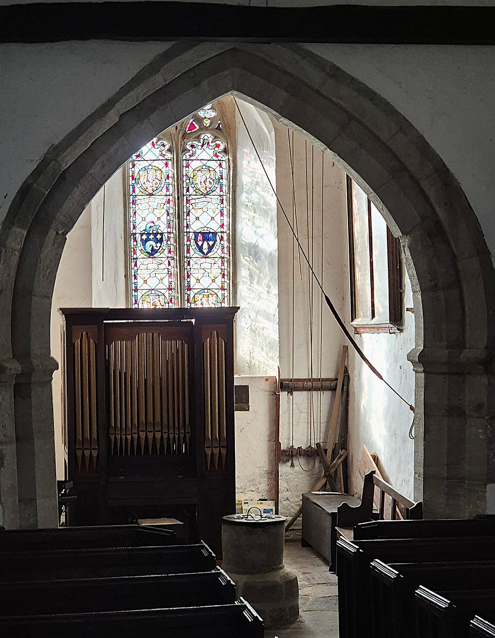 3.4 Interior, looking west from the pulpit. The Symonds memorial window is behind Mrs Symo