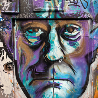 Colour photograph of grafiti painted double doors, Melbourne Australia.