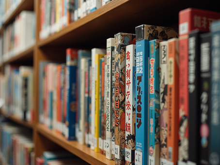 Western comics and Japanese manga side by side on a bookshelf