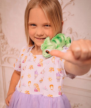 Young girl giving a thumbs up after enjoying a class