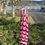 Thumbnail: Cranberry Pink Glass Sea Cucumber with Feathered Design Garden Art Sculpture