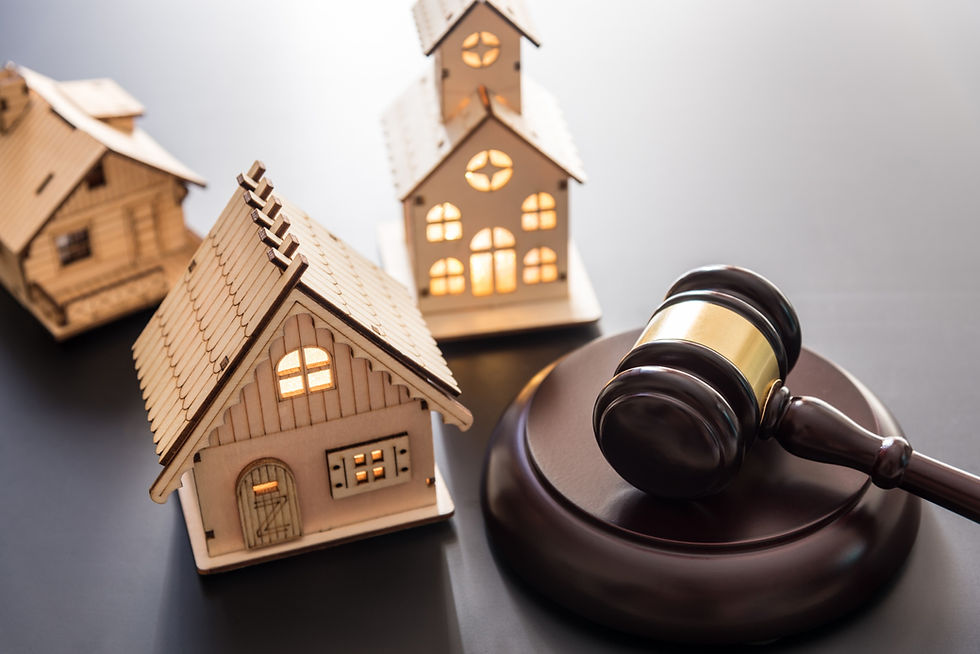 Wooden toy homes and a gavel