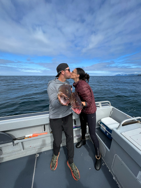 kissing couple with fish