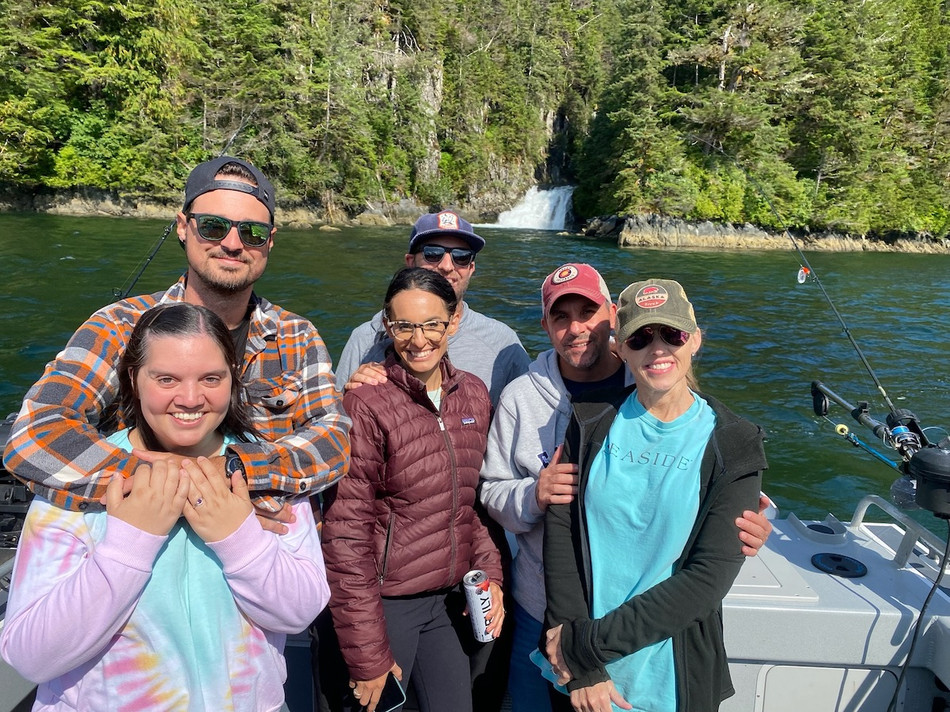 6 people on a boat