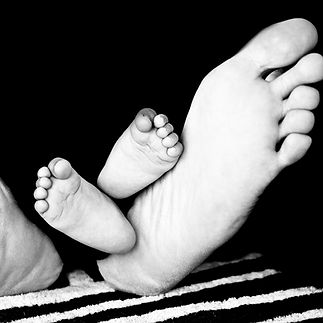 Parent And Baby Feet