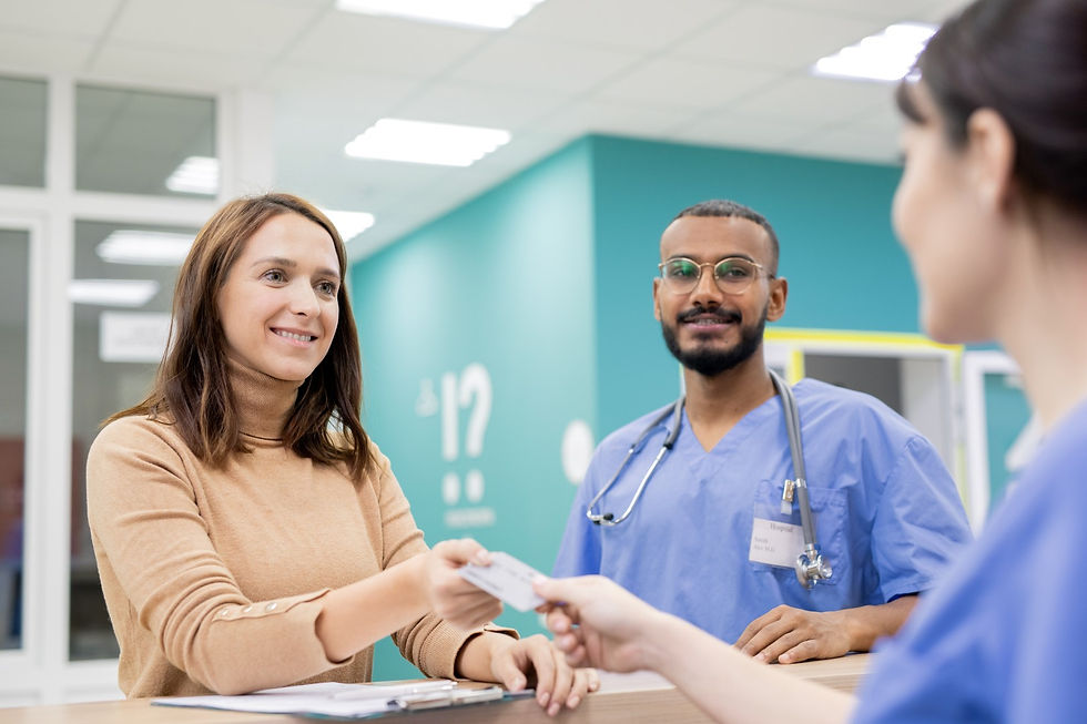 patient-giving-credit-card-to-receptionist-in-clin-2025-04-01-07-22-46-utc (Large).JPG