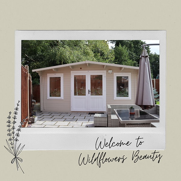 Photograph of garden salon. Wooden cabin painted taupe with central white door between 2 white windows. single story apex roof.