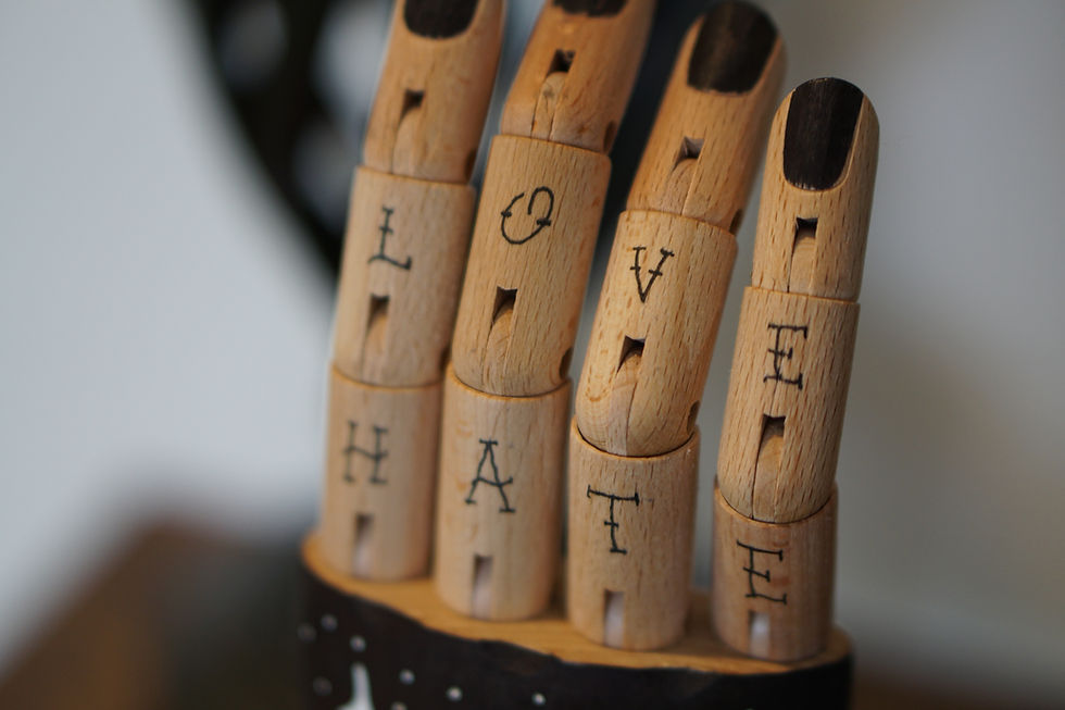 Thumbnail: RISE ABOVE WOODEN HAND