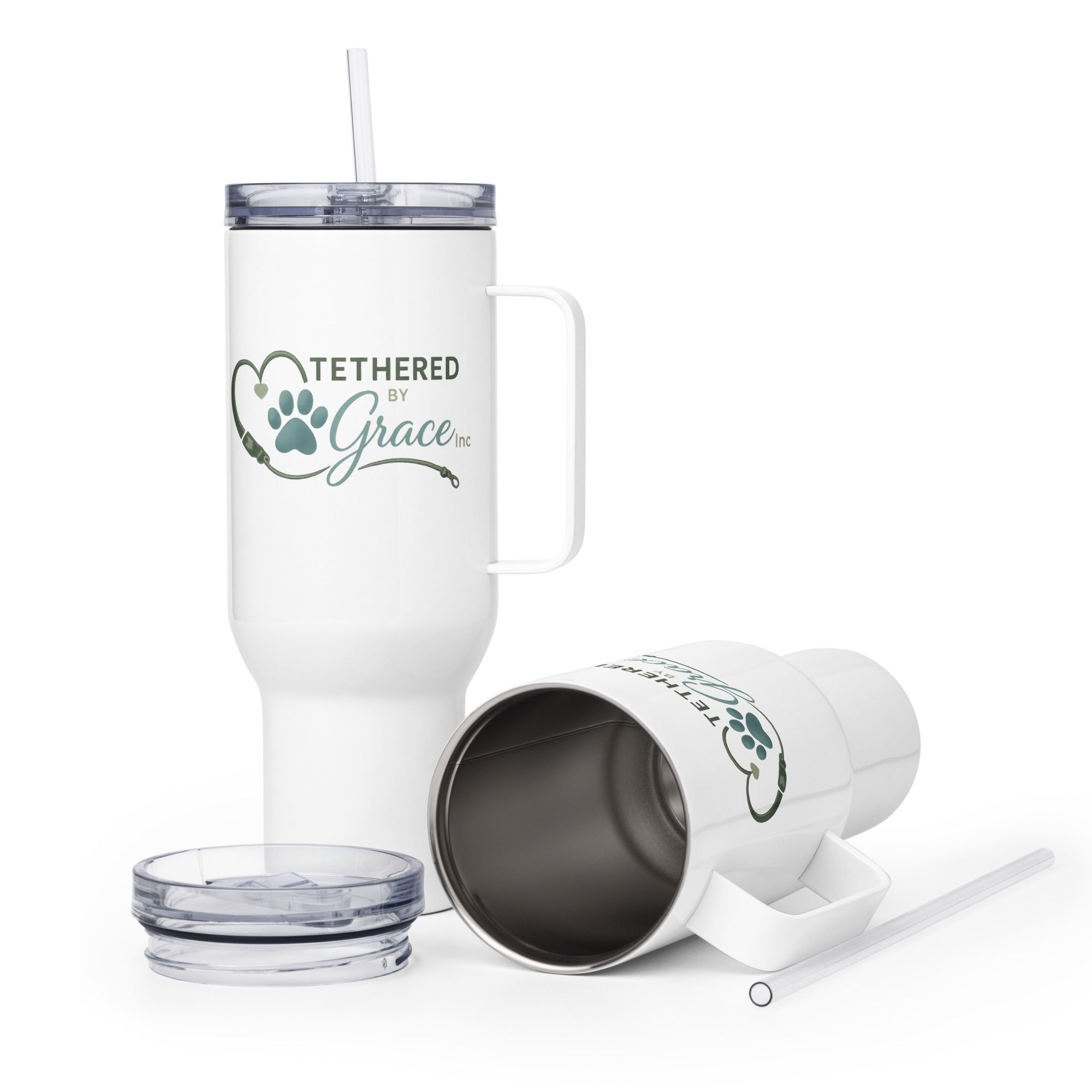 Stainless steel travel mug with lid and straw by Tethered by Grace.