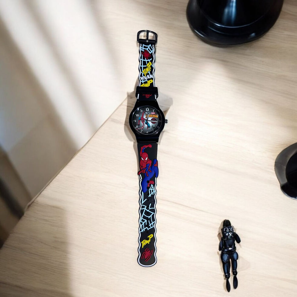 Colorful Swatch watch and figurine on desk
