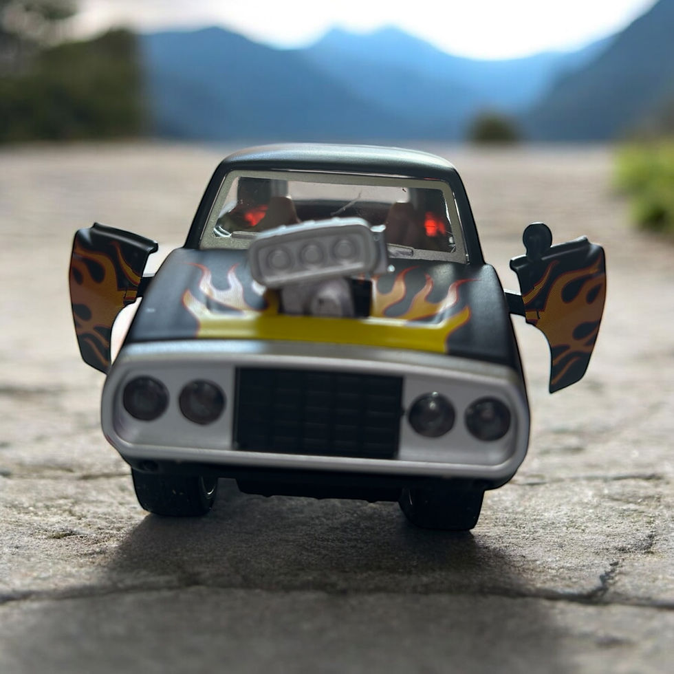 Black toy muscle car with flames