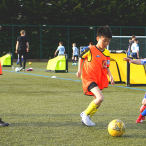How many on each side in a Childrens football match?