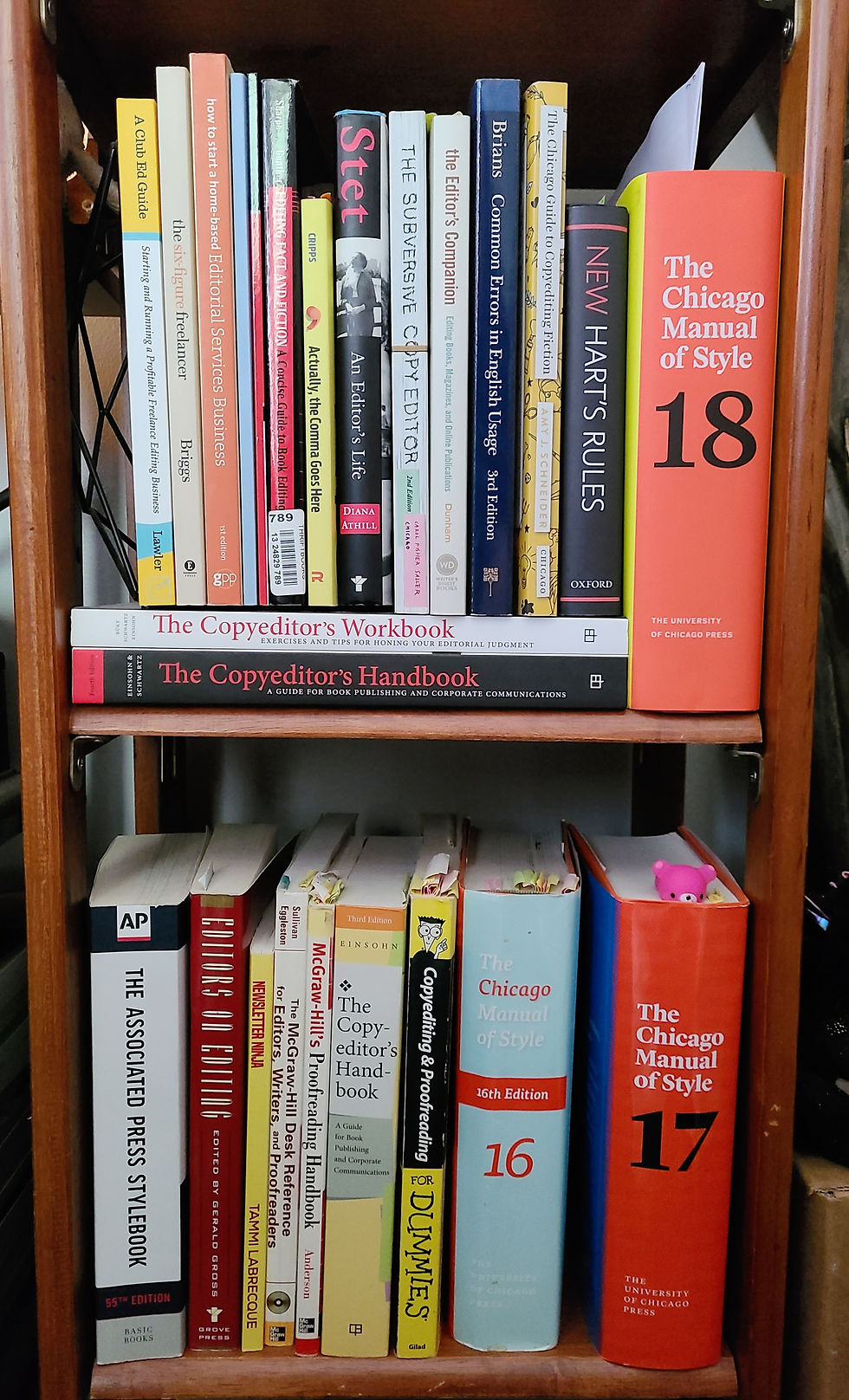 Editing-related books within reach at my desk, including CMOS, 18th edition