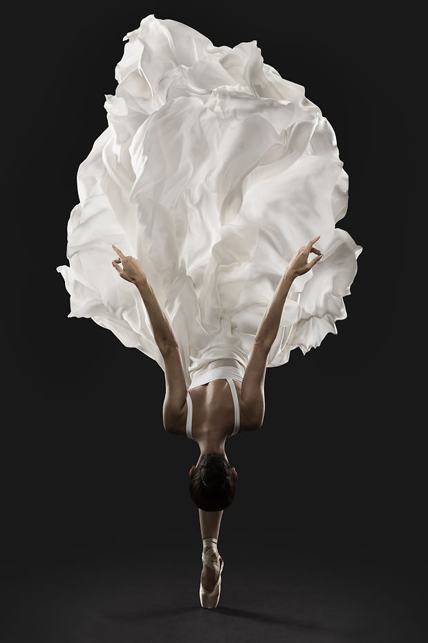 Ballerina Graceful Jump in White Silk Dress, Ballet Dancer Pointe Shoes in Fluttering Clot