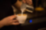 Barista Pouring Milk