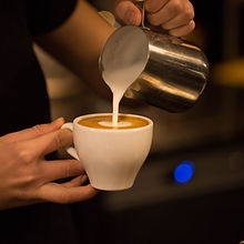 Barista Pouring Milk