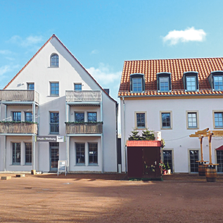 Restaurierte Mehrfamilienhäuser in der Kreischaer Straße