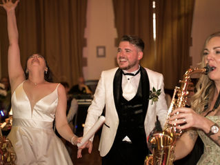 Married couple enjoying Live DJ & Saxophone (Sax) Wedding Music in the North East