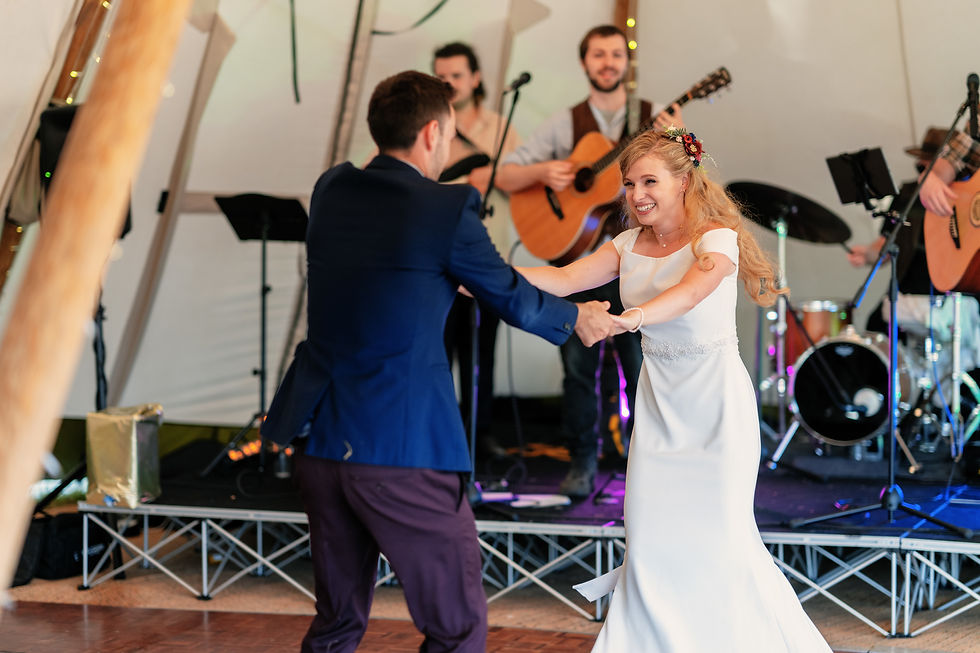 High angle view of a small acoustic duo performing at an indoor wedding drinks reception