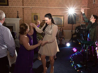 Live wedding singer engaging guests with heartfelt performance
