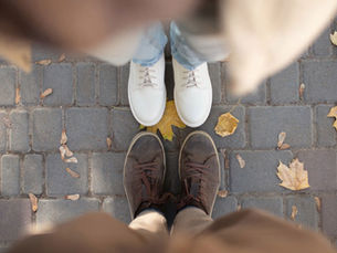 Feet of a couple facing each other