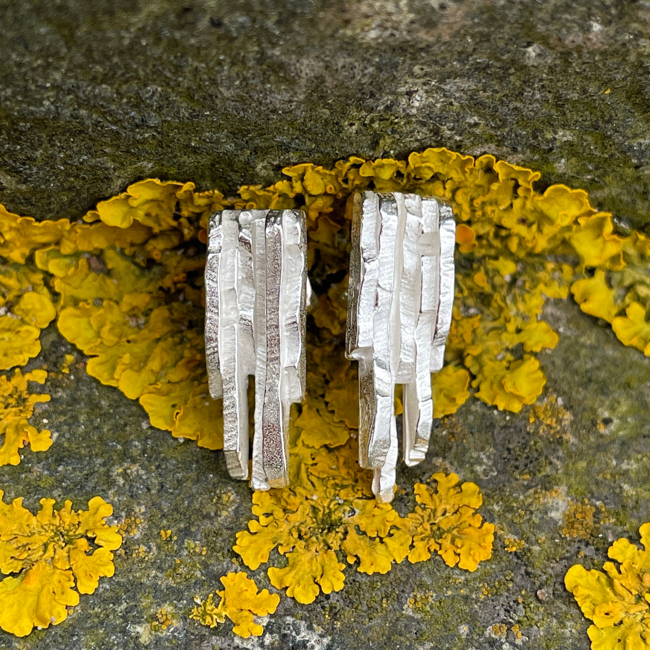 Strata long stud earrings