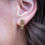 Thumbnail: Strata gold plated long stud earrings