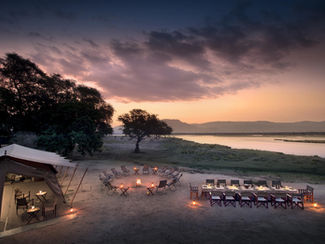 sunset with campfire Zambezi Expeditions