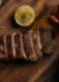 Sliced grilled steak from the Rosa Negra Miami menu