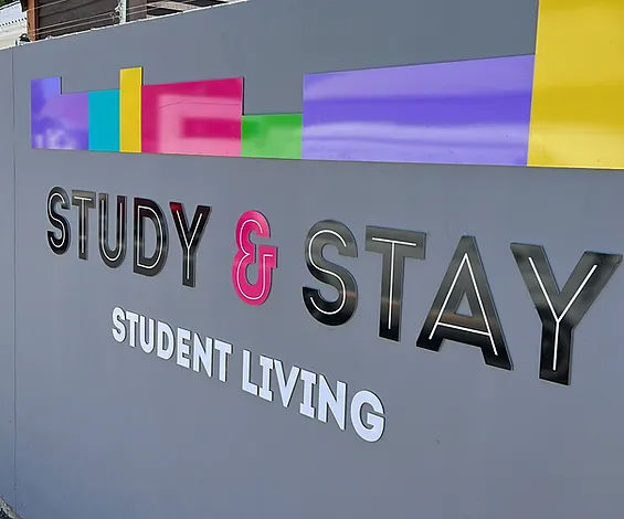 Study and stay logo on the wall.