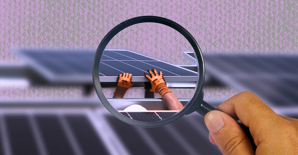 Hand holds magnifying glass over a person installing a solar panel. Purple patterned background.