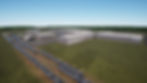 Computer rendering of Industrial complex with Siemens logo, surrounded by green fields and trees. Multiple trains on tracks, under a clear blue sky.