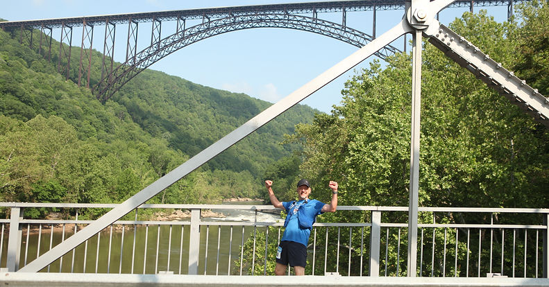Can you outrun a train? Explore the story of the Highball to Thurmond Ultra, a 50-mile race through the New River Gorge where the finish line is a seat on the Amtrak Cardinal. Discover how this unique event highlights the power of passenger rail and history.