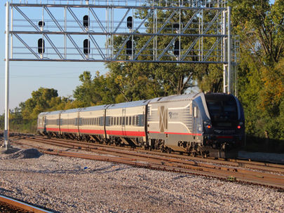 An Amtrak Hiawatha Midwest train with new Amtrak venture coaches