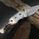 Thumbnail: Damascus steel folding knife, stag horn handle, pocket knife with leather pouch