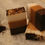 Thumbnail: A rectangular bar of coffee scrub soap with a shea butter base and Moroccan coffee granules, resting on a marble surface with
