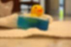 Enjoyable Bath Time Companion: Duck Swimming in Bubblegum Soap
