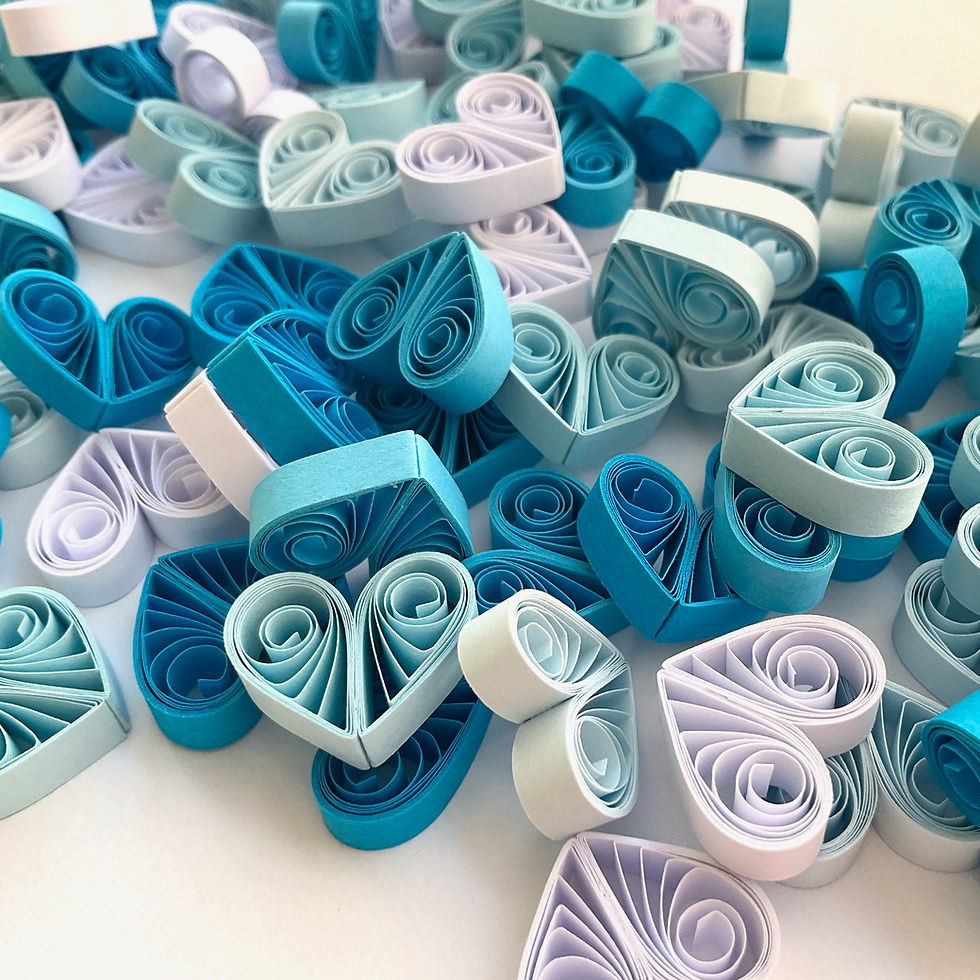 Little blue quilled paper heart ornaments for Valentine and wedding decor