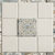 Dusty blue ceramic tile with taupe cream floral scrollwork