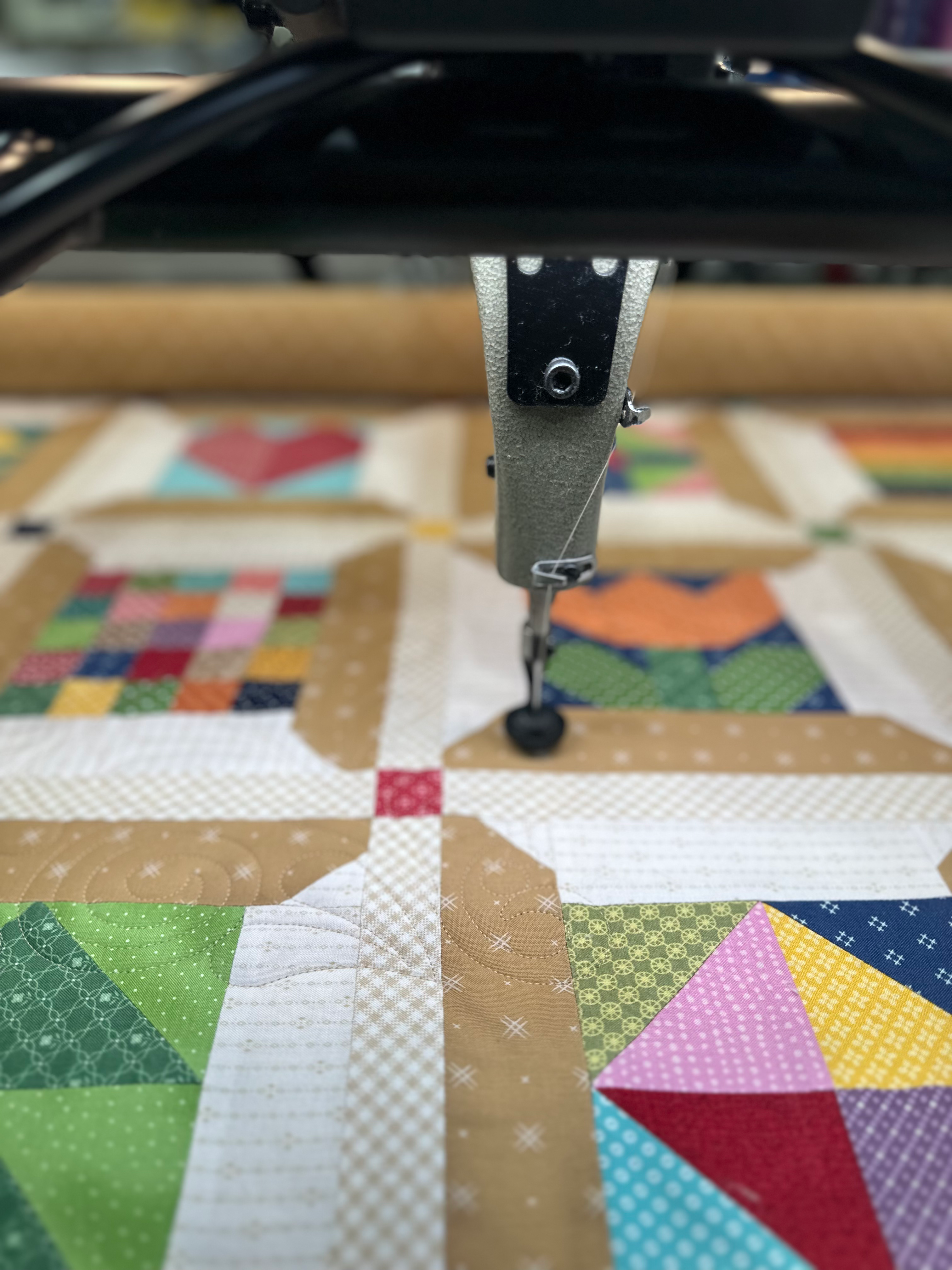 Writer: Quilt Batiks Longarm Studio!