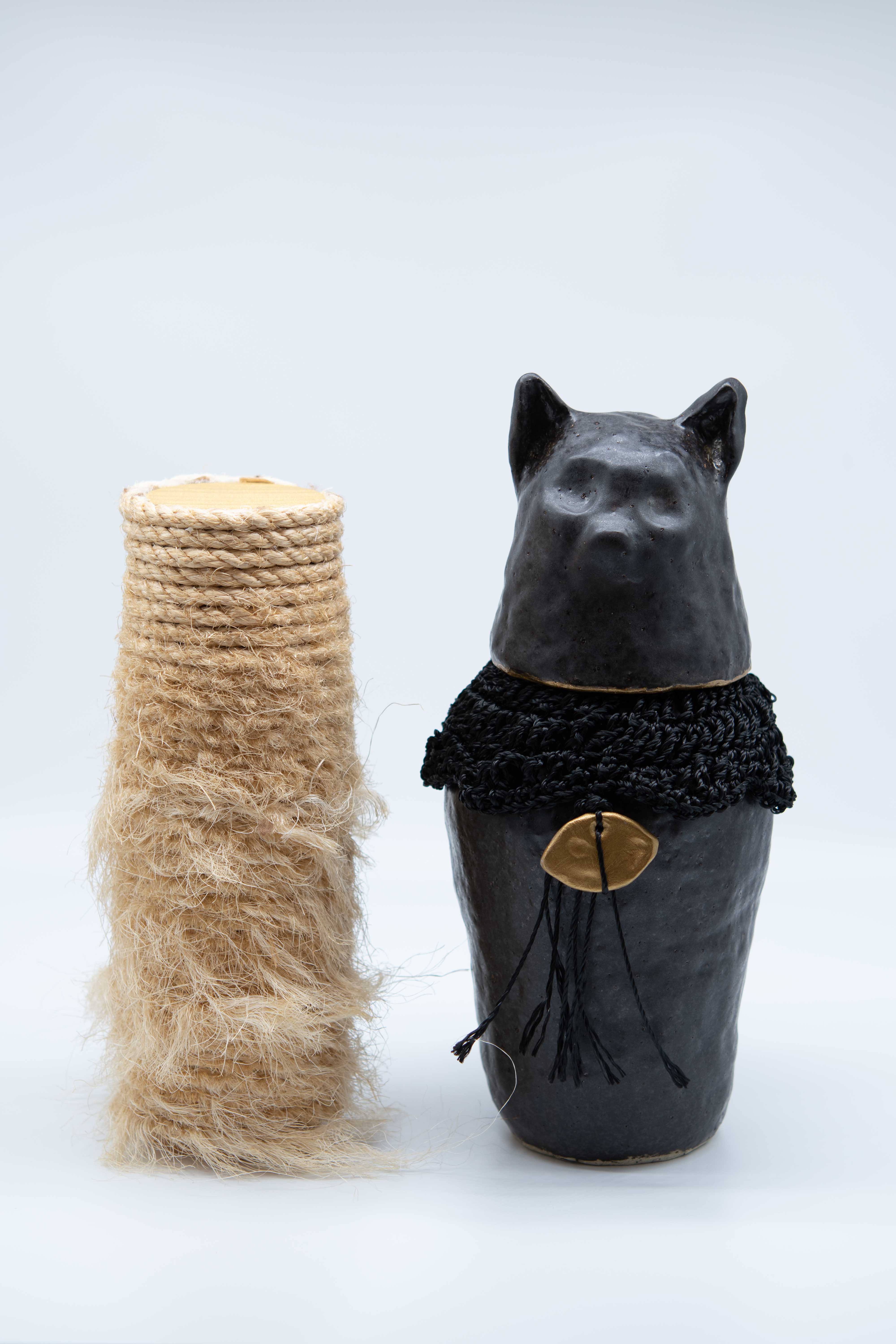 Pakhet (She who scratches) with post