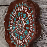 Profile of flower shaped dish painted in robin's egg blue and white