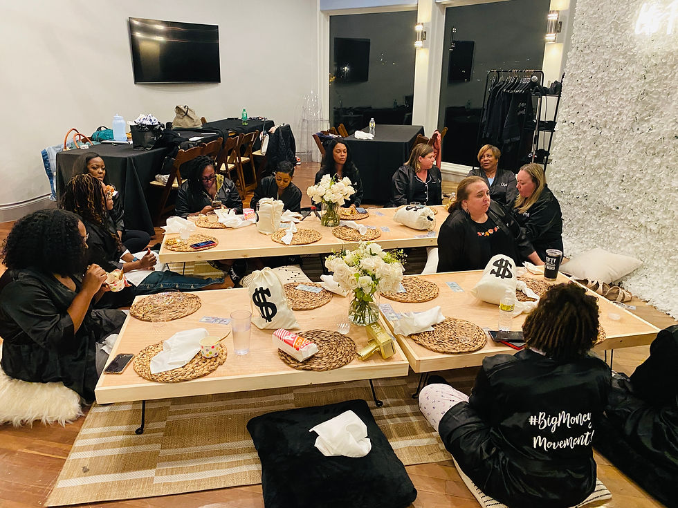Group of women in bathrobes sitting around low tables