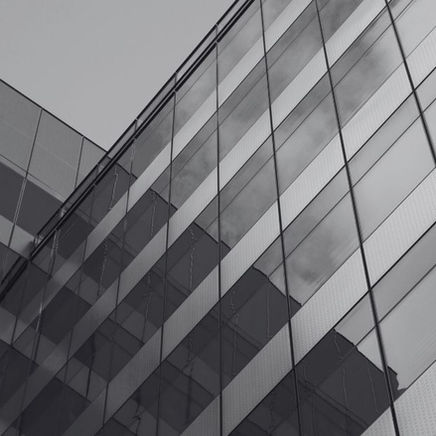 Black and white photo of a corporate building